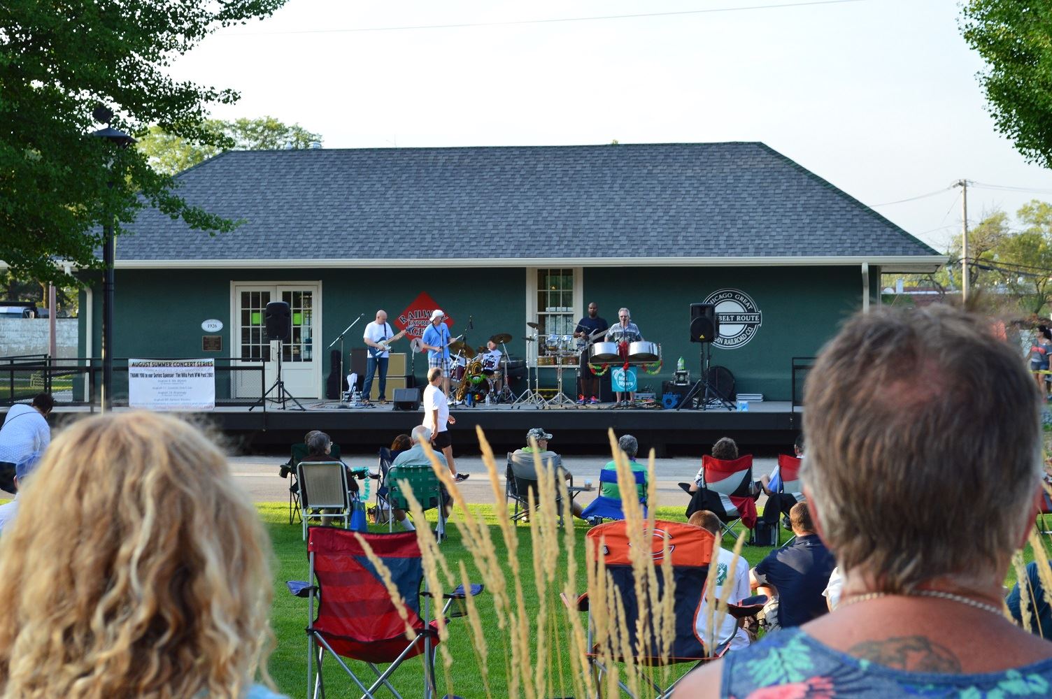 Community members sit on blankets and chairs at Cortesi Veterans Memorial Park to watch Mr. Meyers band perform Aug. 4, 2016.